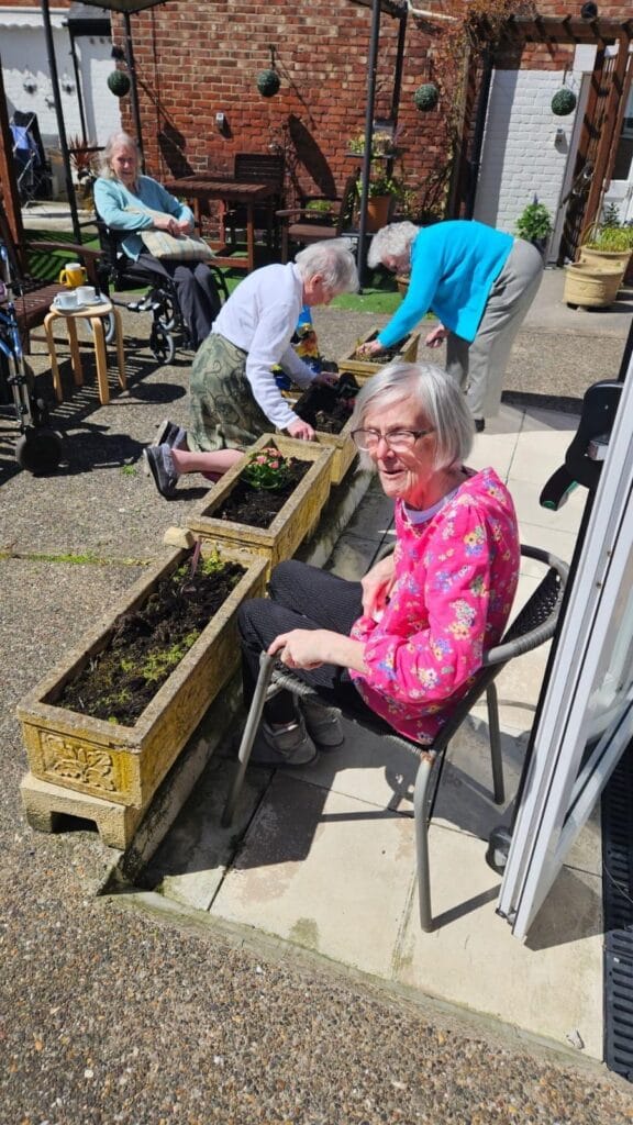 Planting bulbs in spring at Kendal House